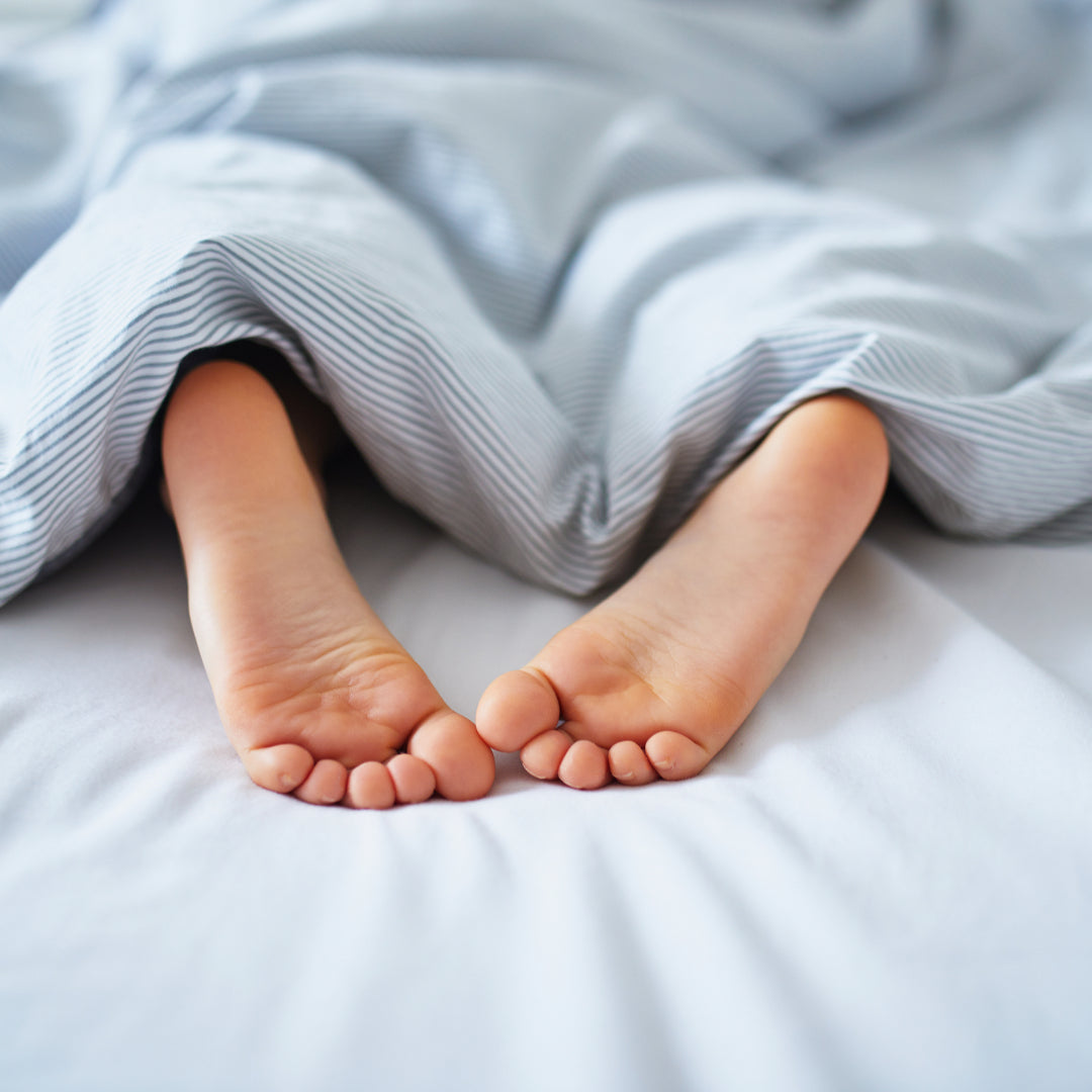 Feet in bed
